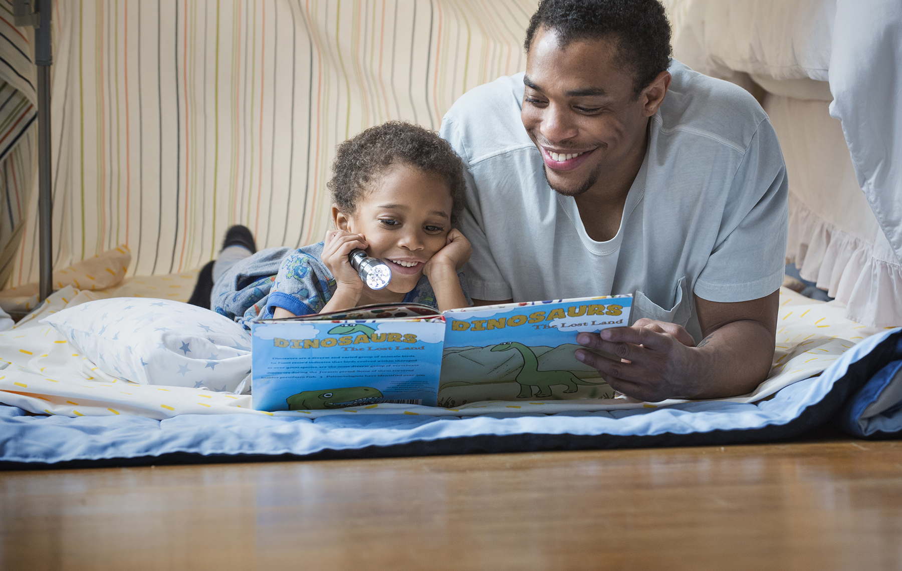Dad Reading to Son