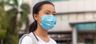 Girl in Mask Back to School